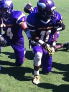 Vikings take knees with a break in the action. 