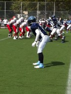 Senior cornerback Shawn Cabbell looks in on line as plays gets ready to start. 