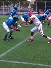 Canarsie defender lines up with JFK receiver.