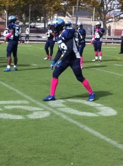 Senior wide receiver Darius Lancaster gets ready to go out for play. 